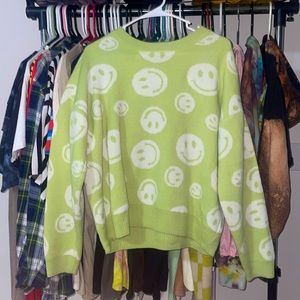 oversized pastel green smiley face sweater